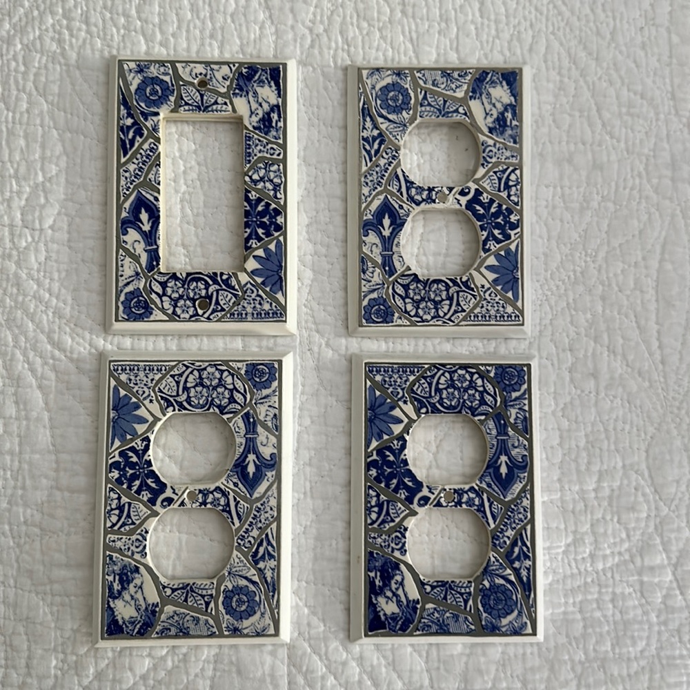 Set of 4 cool blue and white mosaic style light switch covers.